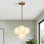 4 - Light Linear Dimmable Sphere Sputnik Design Tiered Chandelier With Glass Globe Shade