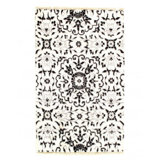 Niviah Floral Area Rug in White