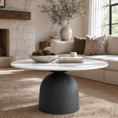 Table basse ronde Meranda avec piédestal en bois massif noyer