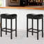 Ensemble de 2 tabourets de bar sans dossier de 65 cm avec siège en cuir souple, pouvant supporter jusqu'à 136 kg, idéal pour un îlot de cuisine moderne.-1577201786-1588077910-1593289187