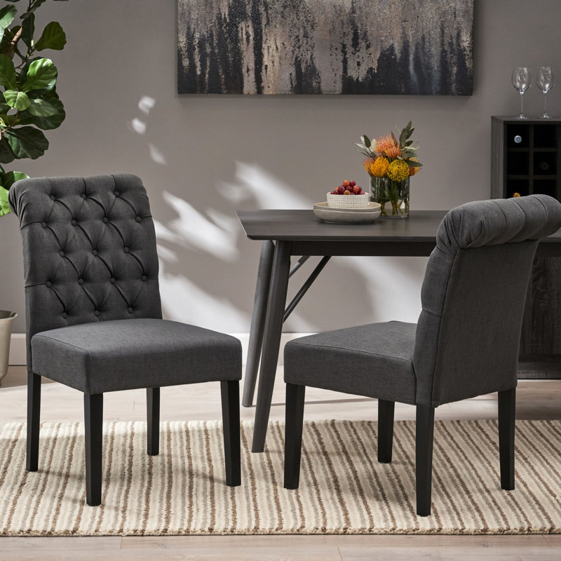 Ensemble de chaises de salle à manger touffetées à roulettes, idéal pour une utilisation quotidienne dans la salle à manger