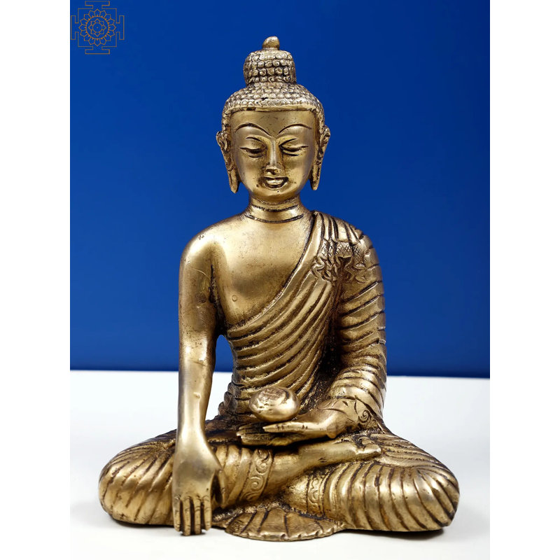Bouddha en terre touchant un geste bouddhiste tibétain en laiton