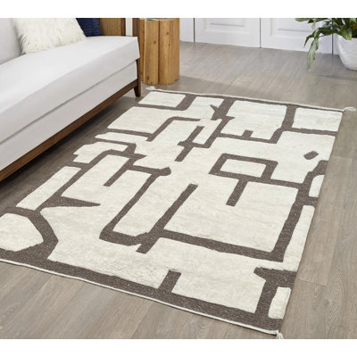 Tapis beige beige à rayures géométriques crème et beige