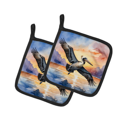 Paire de porte-casseroles Pelican Fyling au lever du soleil