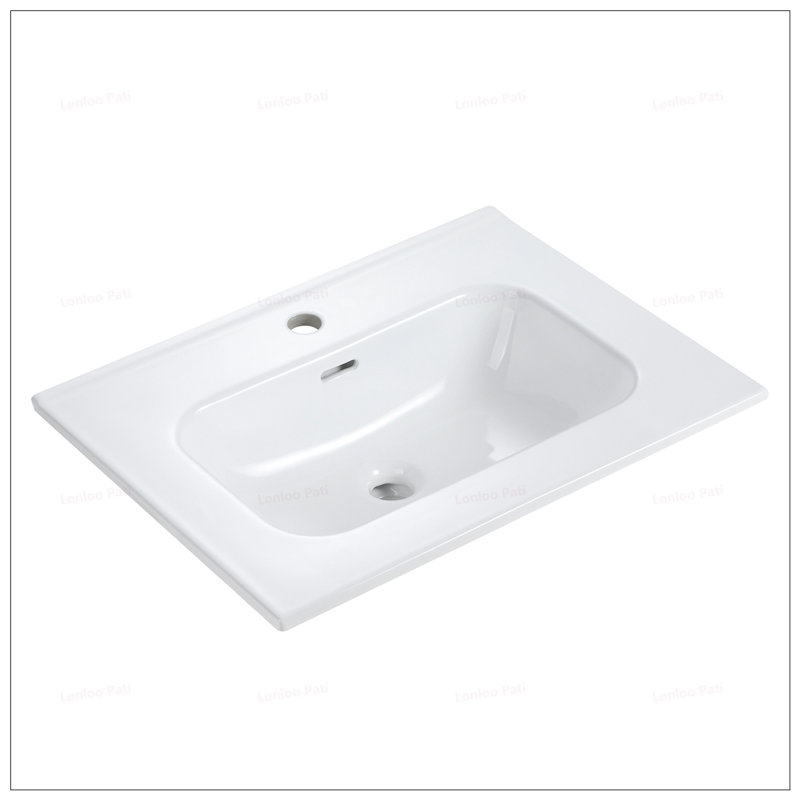 Lavabo intégré en céramique blanc brillant avec un trou de robinet prépercé pour l'élégance de la salle de bain ou de la cuisine