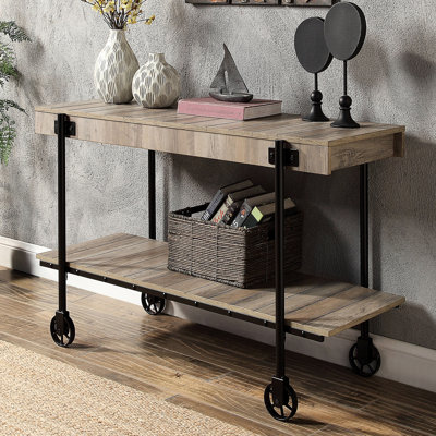 Rectangular Industrial Desk With Natural Tone Finish And Open Bottom Shelf For Office Transitional Table Replicated Wheel Legs In