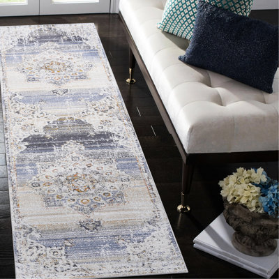Tapis crème / doré Stain