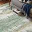 Tapis abstrait vert lavable à la machine Pavelina-1684552002-1683588613