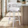 Deherrera Modern Swivel Counter or Bar Stool with Open Low Back and Footrest in Metal and Faux Leather