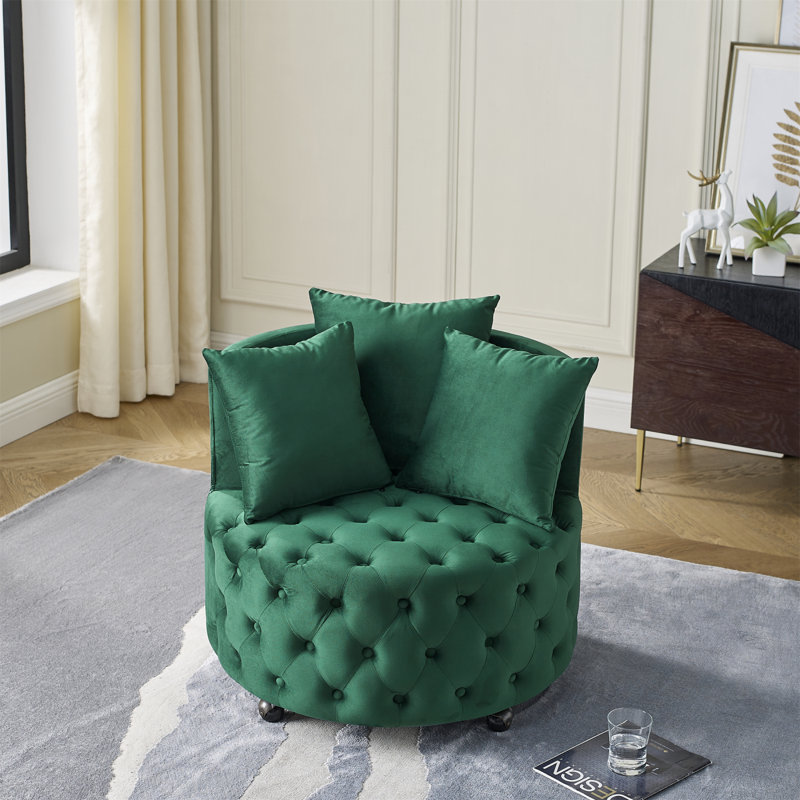 Fauteuil pivotant en velours capitonné pour le salon