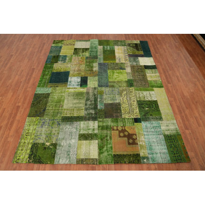 Tapis vert patiné en laine 8 x 10