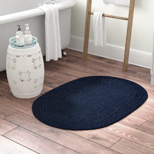 August Grove Lisk Oval 100% Cotton Solid Bath Rug Size: 17 W x 24 L, Color: Gray