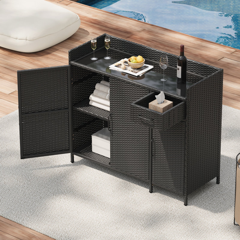 47.5"W Wicker Outdoor Storage Cabinet with Tempered Glass Desktop, Weather-proof Rattan Bar Table with Three Doors, Adjustable Shelf, and One Drawer, for Outdoor Cushions, Pool Toys , Black Brown
