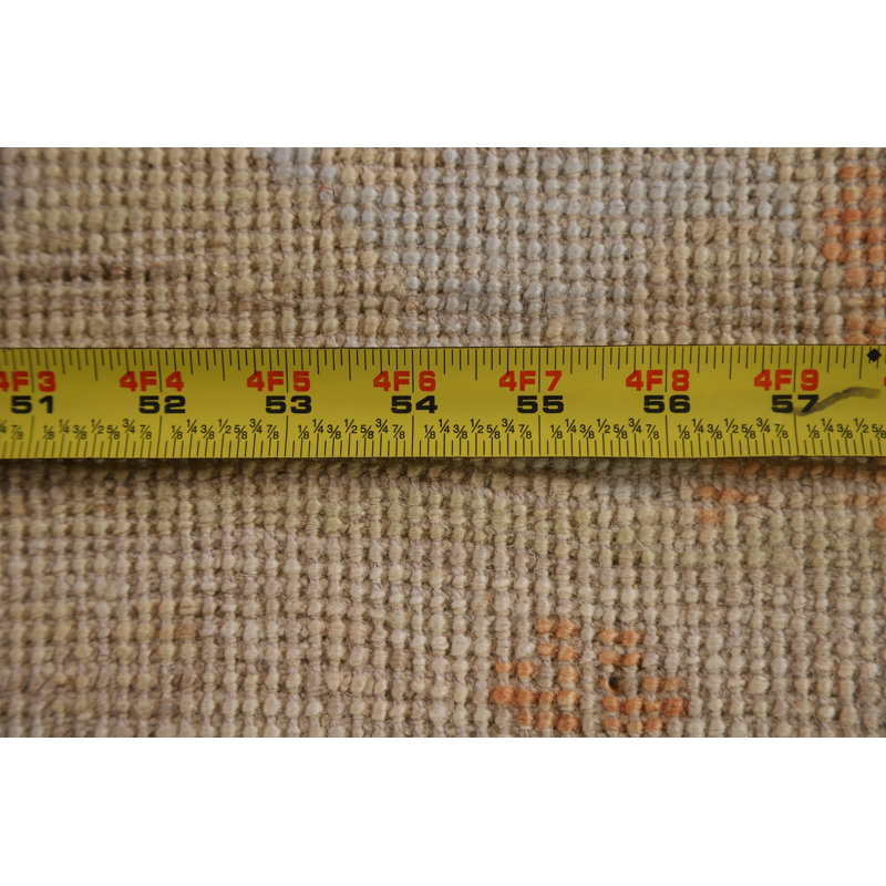Tapis oriental beige en laine noué à la main 6 pi x 8 pi 8 po
