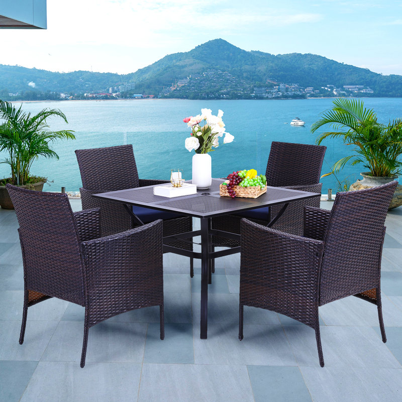 Leonard 4 - Person Patio Dining Set with Square Table , Cushions Included