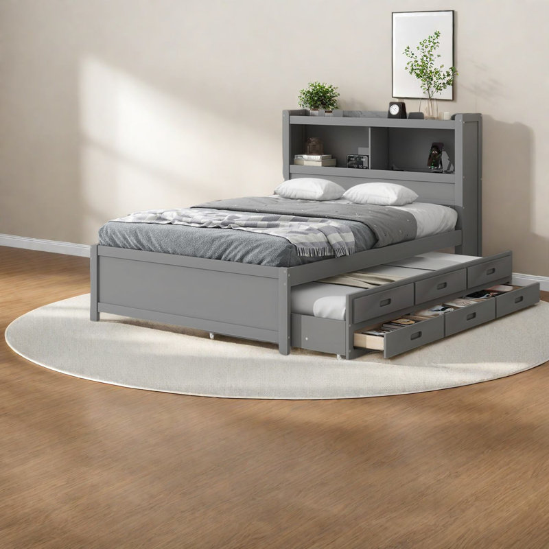 Lit plateforme en bois gris avec gigogne et tiroirs de rangement peu encombrants