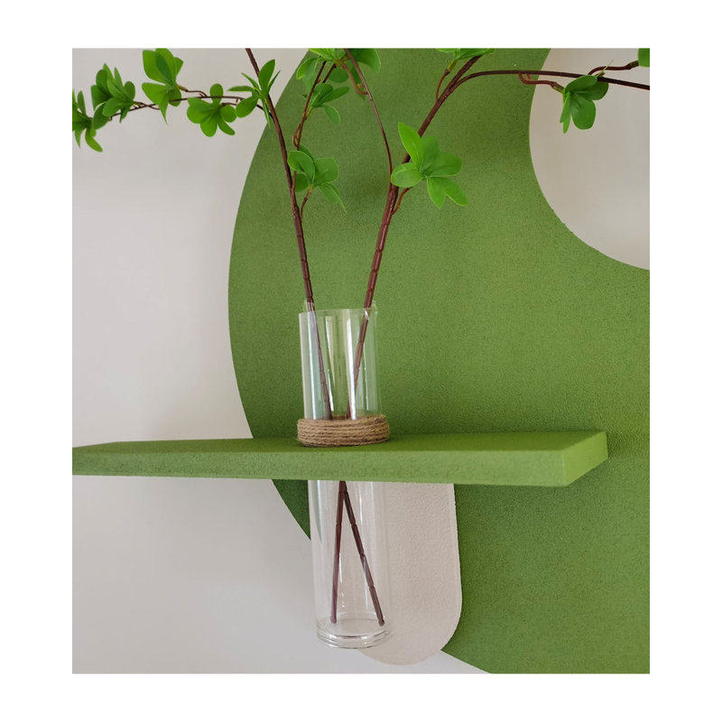 Sculpture murale circulaire ajourée avec vase pour un décor minimaliste de salle à manger., 19.69" H x 25.59" W x 4.72" D