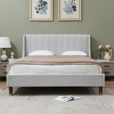 Linvel Upholstered Wingback Platform Bed