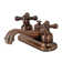 Kingston Brass Restoration Two-Handle 3-Hole Deck Mount 4" Centerset Bathroom Faucet with Plastic Pop-Up