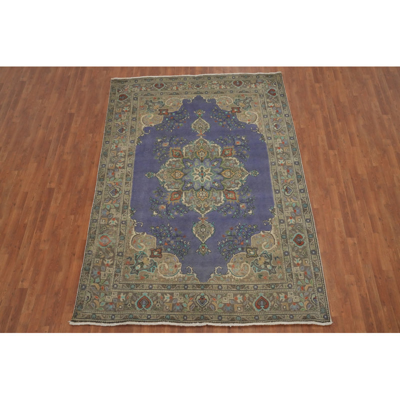 Tapis traditionnel mauve en laine 7 x 9