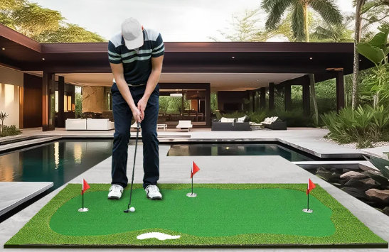 man playing golf on putting green