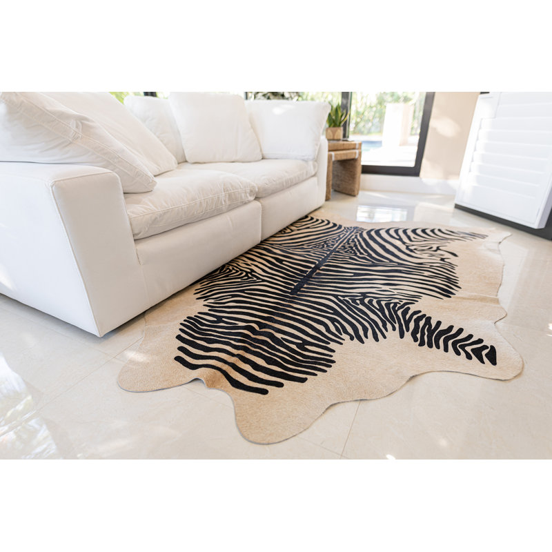 Tapis noir / beige en peau de vache à imprimé animal