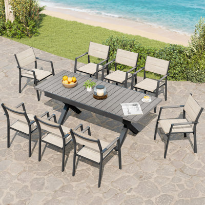 Ensemble de salle à manger extensible 9 pièces pour patio, table et chaises empilables en aluminium antirouille pour 8 personnes, idéal pour terrasse, jardin ou intérieur, fini chêne blanchi.