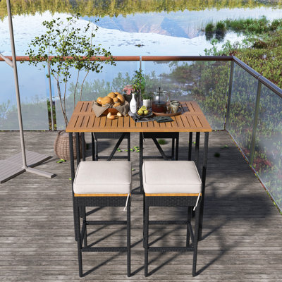 5-Piece Outdoor Acacia Wood Bar Height Table And Four Stools With Cushions