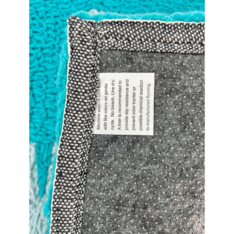 Tapis bleu tuffeté