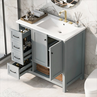 Meuble-lavabo avec comptoir d'évier, armoire de salle de bain avec tablette ouverte, deux portes et deux tiroirs