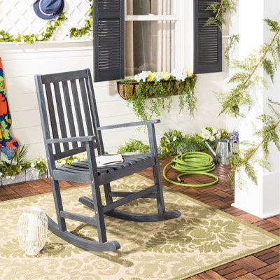 Chaise berçante d'extérieur en bois massif