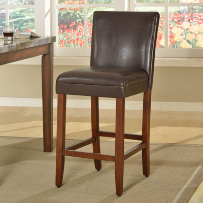 Taib Upholstered Faux Leather Counter Stool