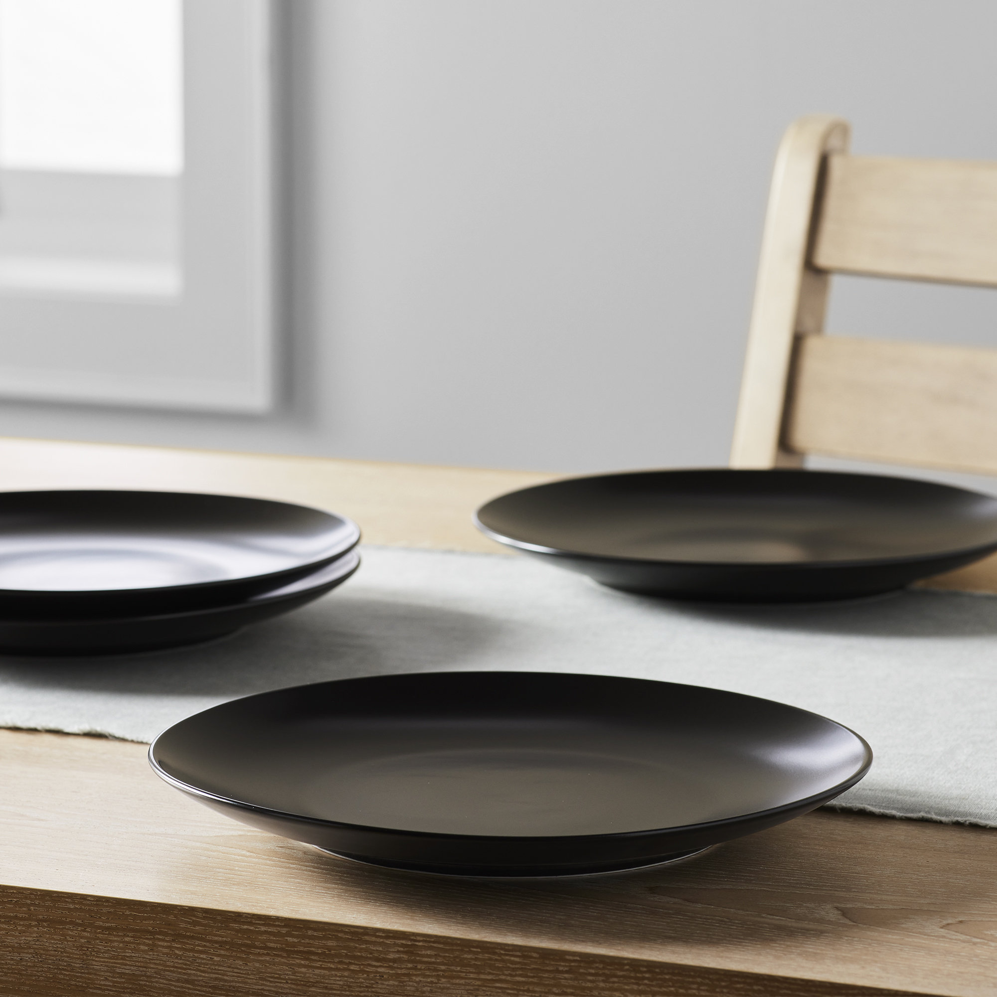 Izie Coupe Stoneware Dinner Plate, Black