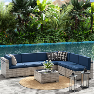 https://assets.wfcdn.com/im/45633569/resize-h310-w310%5Ecompr-r85/2624/262476281/marenna-7-piece-rattan-sectional-seating-group-with-cushions.jpg