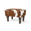 Repose-pieds en peau de vache avec pieds en bois-124590481
