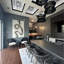 Ensemble de salle à manger rectangulaire en rotin tressé à la main, 11 pièces, avec coussins et oreillers-311937926-491813483