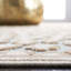 Banerjee Animal Print Area Rug in Stone/Aqua-778425403