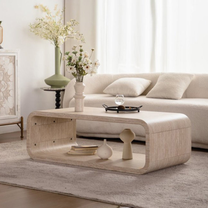 Table basse courbée moderne avec rangement ouvert