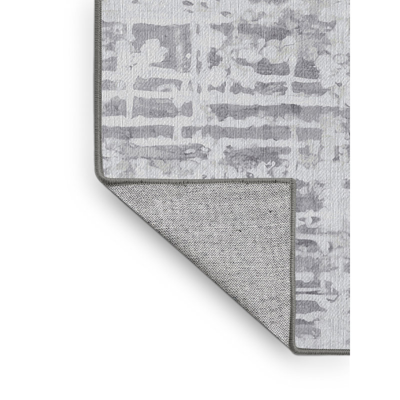 Tapis gris lavable à la machine