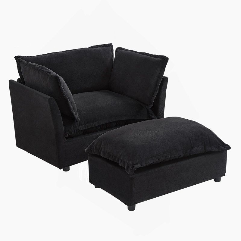 Fauteuil moderne avec repose-pieds mobile, siège large, accoudoirs courbés et coussins moelleux pour un salon et une chambre à coucher confortables