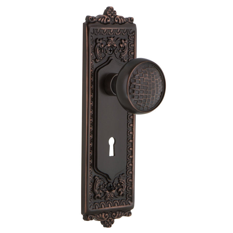 Egg & Dart Plate avec trou de serrure décoratif et bouton de porte Craftsman, 2 3/8 po, Bronze intemporel