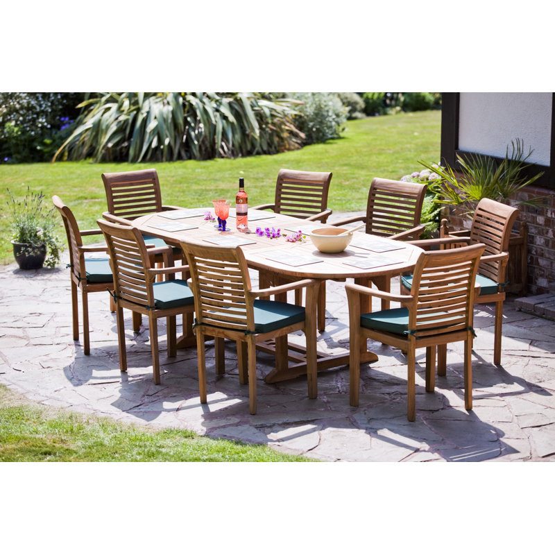 Hartridge 8 - Person Teak Wood Patio Dining Set with Extendable Oval Table , Cushions Included