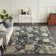 Darreyl Hand Knotted Wool Area Rug in Black