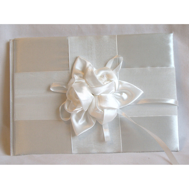 Livre d’or trois roses