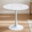 Table ronde à texture de marbre