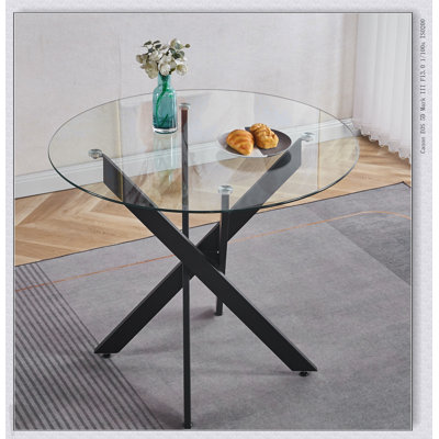 Table de salle à manger moderne noire avec plateau en verre trempé et pieds croisés en métal, parfaite pour économiser de l'espace dans les salons
