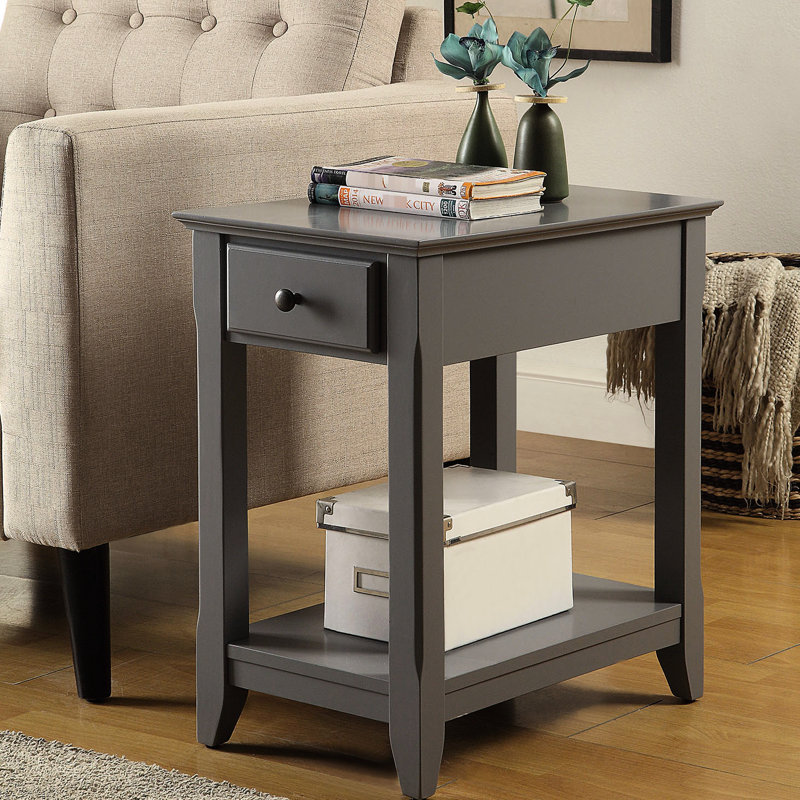 Table rectangulaire grise avec tablette ouverte en dessous du bas pour un pied de rangement inférieur