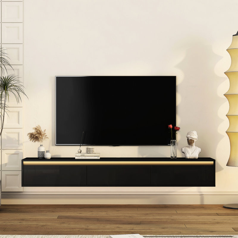Meuble télé flottant avec ports et rangement spacieux, noir ultrabrillant, convient aux téléviseurs de 60 à 69 po, conception de tablette ouverte décorative, pratique