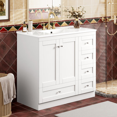 Armoire de salle de bain sur pieds 36 po avec lavabo en céramique, 4 tiroirs à fermeture en douceur et 2 portes à fermeture en douceur Shaker