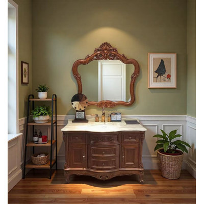 Meuble-lavabo en chêne de style européen avec plateau en marbre et sculptures